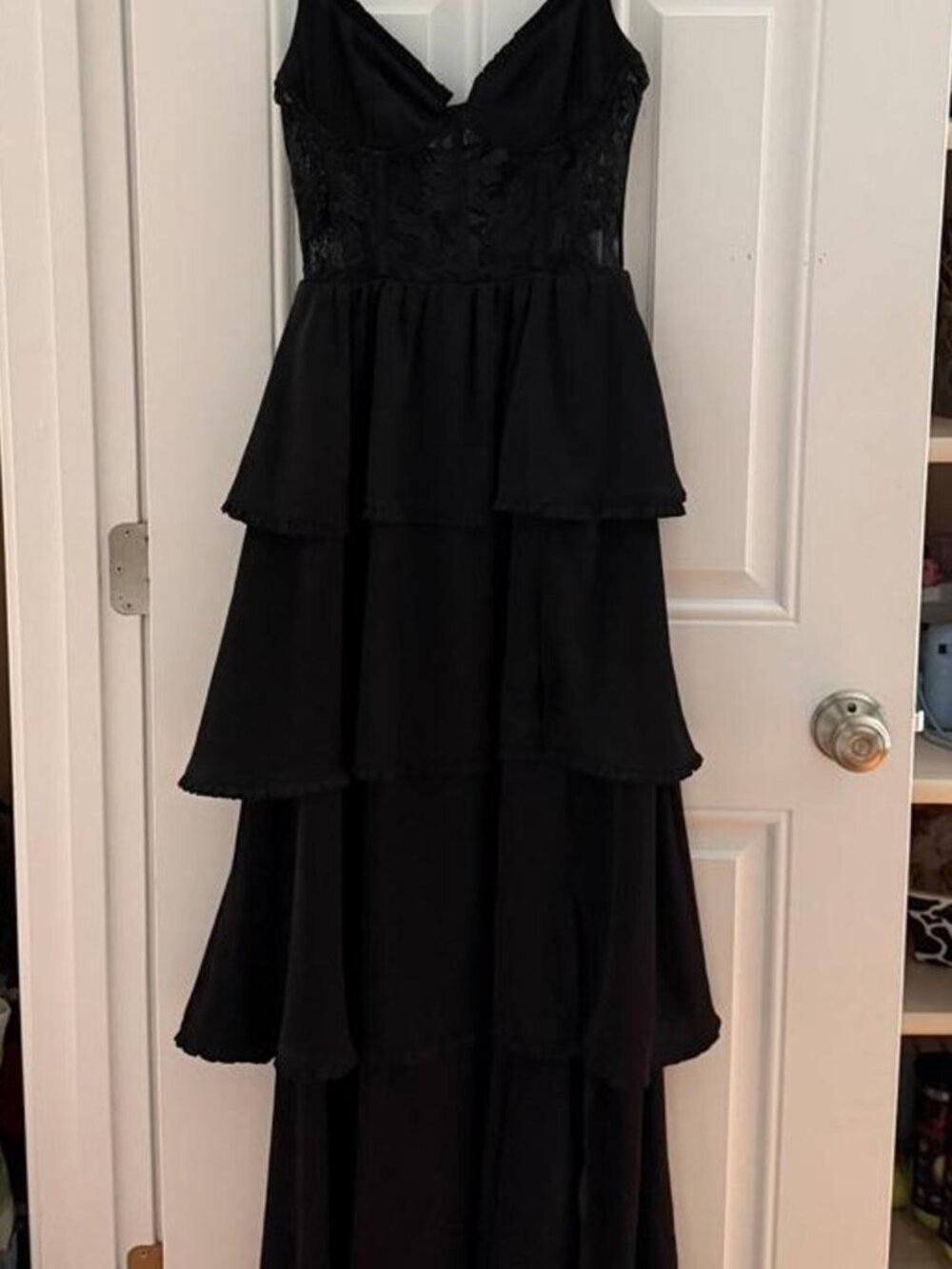 Black lace maxi dress with ruffled tiers and...